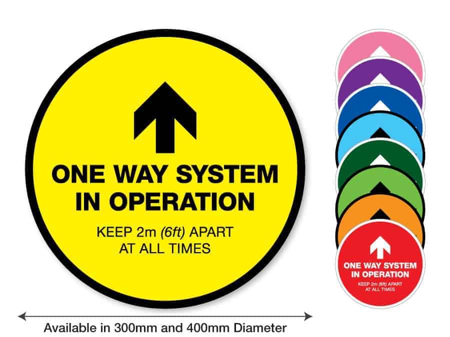 Round yellow Social Distancing Sticker that says "One Way System in Operation" on the left plus 8 other colours o the right