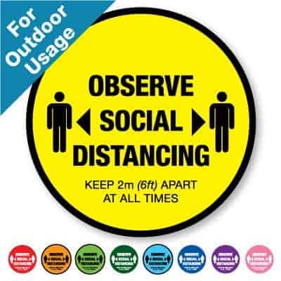 Round yellow Social Distancing Sticker for outdoor usage that says "One Way System in Operation" on the top plus 8 other colours o the bottom