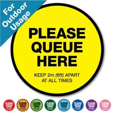 Round yellow Social Distancing Sticker for outdoor usage that says "Please Queue here" on the top plus 8 other colours o the bottom