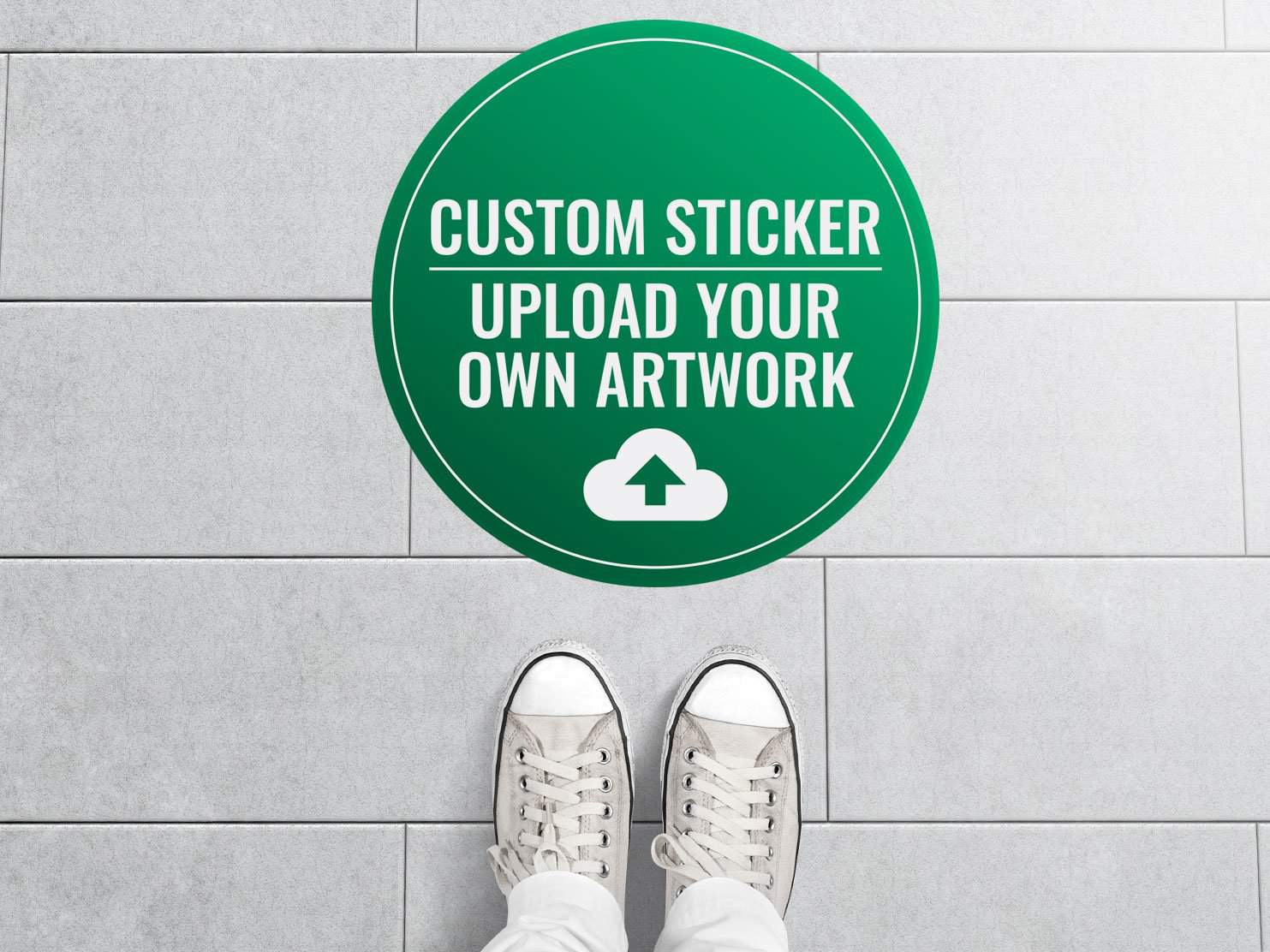a round green and white social distancing sticker on a smooth tiled floor that says "custom artwork - upload your own artwork"