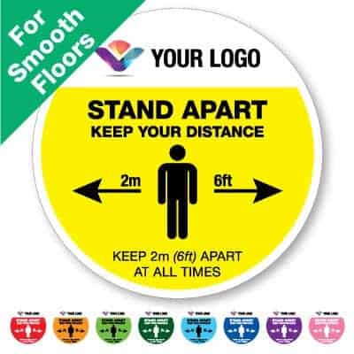 Round yellow Social Distancing Sticker for smooth floors branded with a logo that says "stand apart keep your distance" on the top plus 8 other colours o the bottom