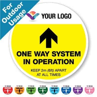 Round yellow Social Distancing Sticker branded with logo for outdoor usage that says "One Way System" on the top plus 8 other colours o the bottom